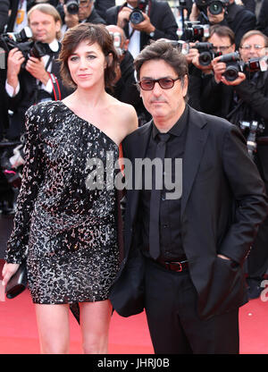 Actress Charlotte Gainsbourg and actor Yvan Attal attend The Meyerowitz Stories screening during the 70th annual Cannes Film Festival at Palais des Festivals on May 21, 2017 in Cannes, France. Stock Photo