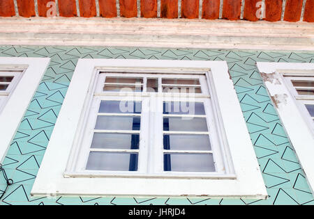 Decorative modern tile wall facade Azulejos with window on fisherman's house Aveiro Portugal Stock Photo