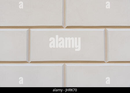 Background from beige rectangular stone blocks Stock Photo