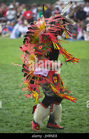 Man dancing during Canada Day powwow in Prince's Island Park.  The celebration commemorates Canada's 150th anniversary of confederation. Stock Photo