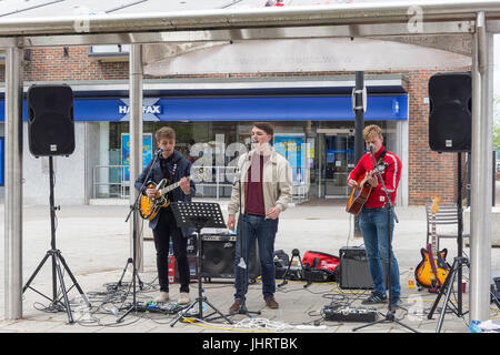 Boy band playing in outdoor concert, London Road, Waterlooville, Hampshire, England, United Kingdom Stock Photo