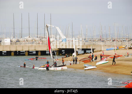 Portland, UK. 15th July, 2017. People enjoy windsurfing and kitesurfing in the fine and breezy conditions in Portland Harbour Credit: stuart fretwell/Alamy Live News Stock Photo