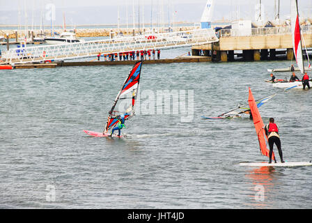 Portland, UK. 15th July, 2017. People enjoy windsurfing and kitesurfing in the fine and breezy conditions in Portland Harbour Credit: stuart fretwell/Alamy Live News Stock Photo