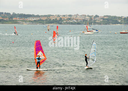 Portland, UK. 15th July, 2017. People enjoy windsurfing and kitesurfing in the fine and breezy conditions in Portland Harbour Credit: stuart fretwell/Alamy Live News Stock Photo