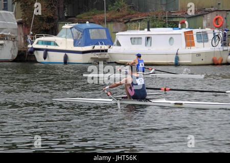 Twickenham Rowing Club (Winner) leads Sons of the Thames Rowing Club. Men's Masters C-D Single FINAL. 150th Molesey Amateur Regatta, 15th July 2017, River Thames, Hurst Park Riverside, East Molesey, near Hampton Court, Surrey, England, Great Britain, United Kingdom, UK, Europe. Annual amateur rowing competition and social event established in 1867. Credit:  Ian Bottle/Alamy Live News Stock Photo