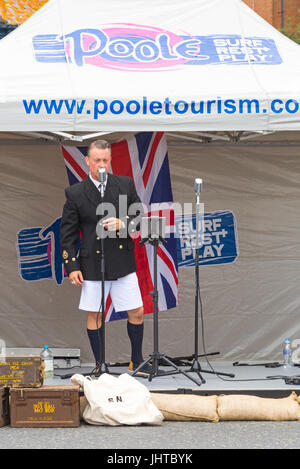 Poole Goes Vintage, Poole, Dorset, UK. 16th July 2017. Poole Goes Vintage Event takes place on the Quay - well dressed compere introducing the performers. Credit: Carolyn Jenkins/Alamy Live News Stock Photo