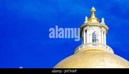 Massachusetts State House golden dome gleaming in sunlight