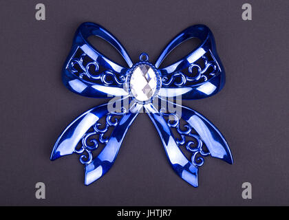 Christmas decoration blue bows on a black background Stock Photo