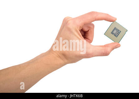 man's hand holding a computer processor isolated on white background Stock Photo