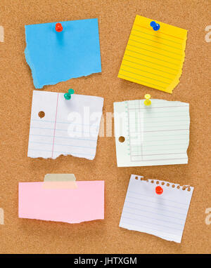 Cork Board with Notes Tacked Up With Copy Space. Stock Photo