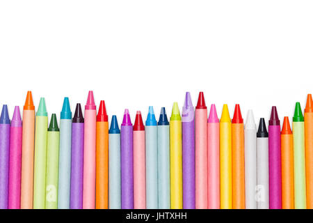 Row of Colored Crayons Isolated on White Background. Stock Photo