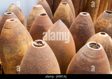 Deadly harvest left over from the Laotian Civil War. Rusting American bombs defused by explosive ordnance engineers. Xiangkhouang, Province, Laos Stock Photo