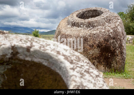 The Plain of Jars, a megalithic archaeological landscape consisting of thousands of stone jars scattered around the Xiangkhoang Plateau. Laos Stock Photo