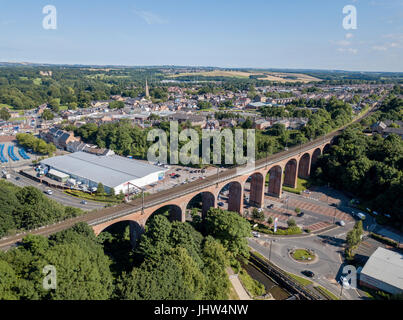 Aerial view of a railway viaduct running by a Tesco grocery store in Chester-le-street, Co. Durham Stock Photo