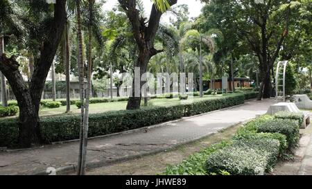 Sathon Road City Park Open Space at Sathorn/Saphan Taksin BTS Skytrain Station Bangkok Thailand Stock Photo