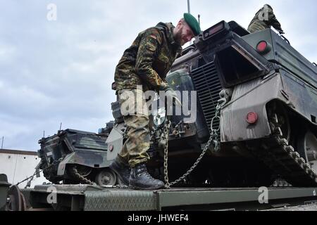 German soldiers load tracked Marder infantry fighting vehicles onto railway carts at the Grafenwoehr Tower Barracks railhead station February 21, 2017 in Grafenwoehr, Germany.    (photo by Gertrud Zach  via Planetpix) Stock Photo