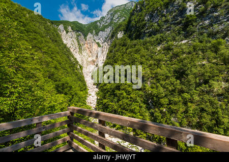 Wooden deck overlooking Boka waterfall in Slovenia. Stock Photo