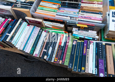 Used paperback books for sale at a street stand in New York City Stock Photo