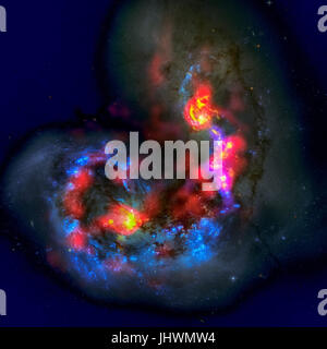 The Antennae Galaxies, NGC 4038, 4039 are a pair of distorted colliding spiral galaxies in the constellation of Corvus. Elements of this image furnish Stock Photo