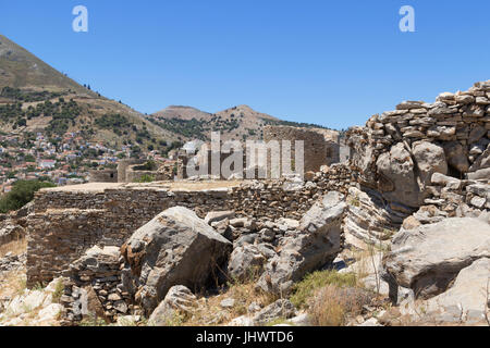 Symi Island, South Aegean, Greece - the remains of hill-top windmills close to the ancient building known as the Pontikokastro, above Horio Stock Photo