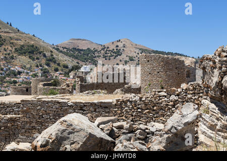 Symi Island, South Aegean, Greece - the remains of hill-top windmills close to the ancient building known as the Pontikokastro, above Horio Stock Photo