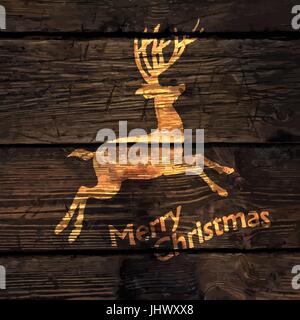 Christmas Greeting Card with Shining Gold Deer Silhouette on Wood Texture Background. Vector illustration Stock Vector