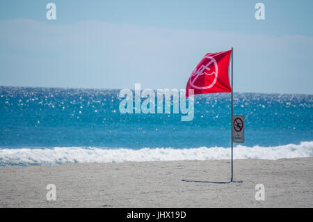 Surf conditions, warning flag and sign, Gulf Coast, sandy ...