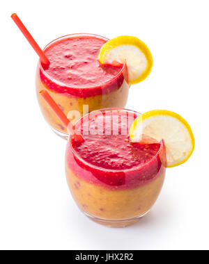 Fruit cocktail in glass with a straw, peach and raspberry Stock Photo