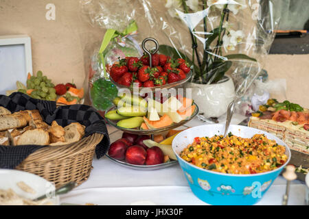 Variety of fresh salads bowls on a buffet table business dinner Stock Photo