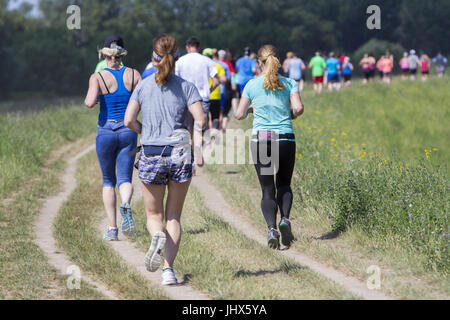 Group of young people on Outdoor cross-country running marathon Stock Photo