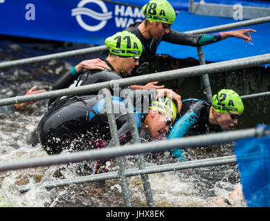 Hamburg, Germany. 16th July, 2017. The women triathletes leave the water during the Mixed Team event at the ITU World Triathlon Series World Championships in Hamburg, Germany, 16 July 2017. Photo: Christophe Gateau/dpa/Alamy Live News Stock Photo