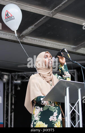 London, UK. 16th July, 2017. Kathaur Abdi, a parent and teacher from Brent, addresses campaigners against cuts to education funding and their families in Parliament Square as part of a Carnival Against The Cuts protest organised by Fair Funding For All Schools. Credit: Mark Kerrison/Alamy Live News Stock Photo