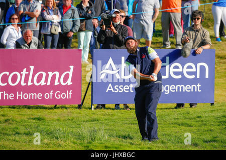 Irvine, Ayrshire, Scotland, UK. 16th July, 2017. The final day of the Aberdeen Asset management Scottish Open Golf Championship provided much drama and exciting play from an international field of golfers competing for the trophy and prize money. The competition was played over Dundonald Links near Irvine Ayrshire Scotland in the hot summer sun and concluded with a dramatic win for RAFA CABRERA BELLO form Spain Credit: Findlay/Alamy Live News Stock Photo