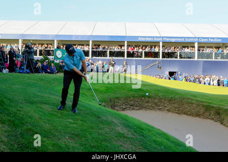 Ayrshire, Scotland, UK. 16th July, 2017. The final day of the Aberdeen Asset management Scottish Open Golf Championship provided much drama and exciting play from an international field of golfers competing for the trophy and prize money. The competition was played over Dundonald Links near Irvine Ayrshire Scotland in the hot summer sun and concluded with a dramatic win for RAFA CABRERA BELLO form Spain Credit: Findlay/Alamy Live News Stock Photo