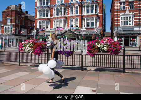 Southport, Merseyside, UK. 17th Jul, 2017. Busy Town Centre, with tourists and shoppers enjoying the sunshine and hot weather, on Open Golf Week. The Championship is based at Royal Birkdale and up to 40,000 spectators are expected in the resort to sample the shopping in Lord Street and the Golf Based attractions in the Princess Diana Gardens in front of The Atkinson in Southport town centre. Credit: MediaWorldImages/Alamy Live News Stock Photo