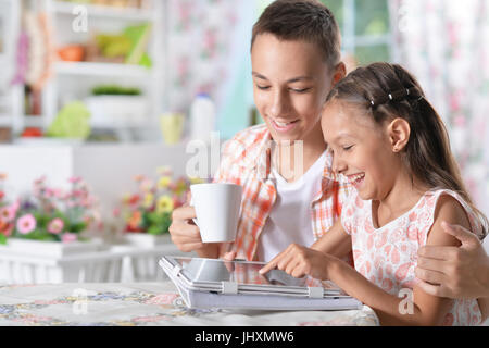 boy and  girl with tablet pc Stock Photo