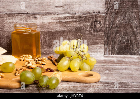 Cheese apetizer on wooden background Stock Photo