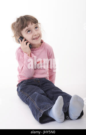 Child call up with, Kind beim telefonieren Stock Photo