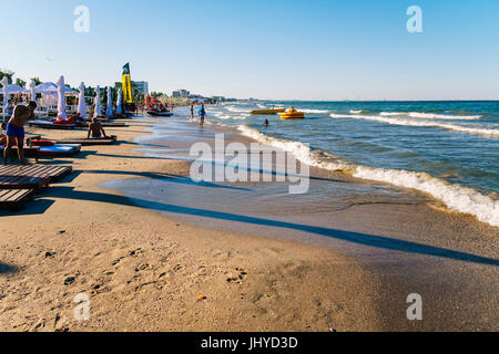 MAMAIA, ROMANIA - JULY 14, 2017: People Having Fun In Water And Relaxing In Mamaia Beach Resort At The Black Sea In Romania. Stock Photo