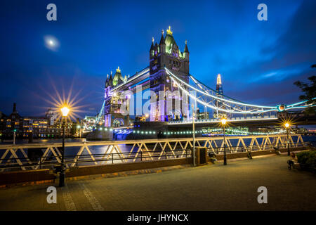 A moonlit evening in London with a view of Tower Bridge and the Shard behind, London, England, United Kingdom, Europe Stock Photo