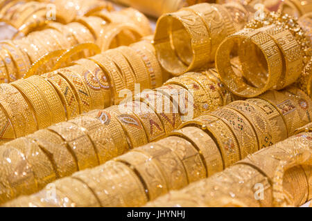 Gold jewellery on sale in shop window, Gold Souk, Dubai, United Arab Emirates, Middle East Stock Photo