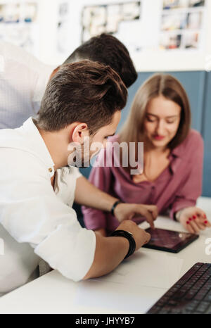 Team of architects and designers working in office. Stock Photo