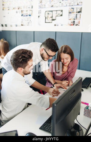 Team of architects and designers working in office. Stock Photo