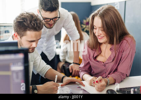 Team of architects and designers working in office. Stock Photo