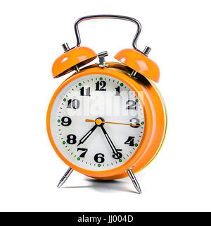 Yellow alarm clock against white background Stock Photo