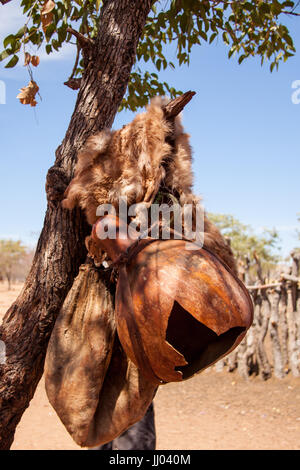 Water Container and Fur in Himba Village, Namibia Stock Photo