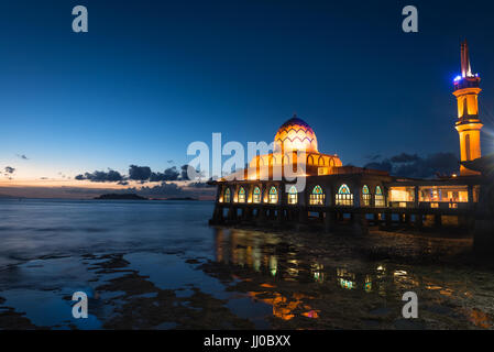 masjid al hussain a floating mosque extends over the Straits of Malacca in evening at kuala perlis, malaysia Stock Photo