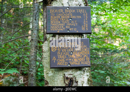 Warning sign along the Appalachian Trail (Beaver Brook Trail) in Kinsman Notch of the New Hampshire White Mountains during the summer months. Stock Photo