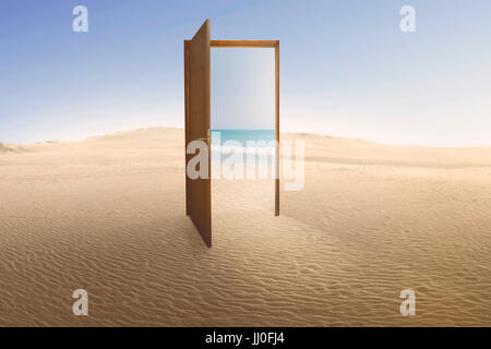Open door with access to the beach from desert. Travel concept Stock Photo