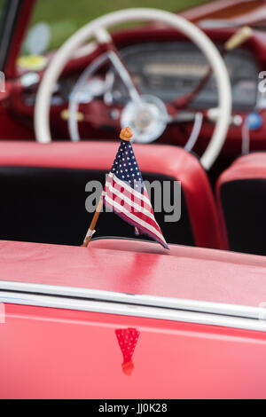 Small American flag on a 1959 Ford Fairlane car Stock Photo